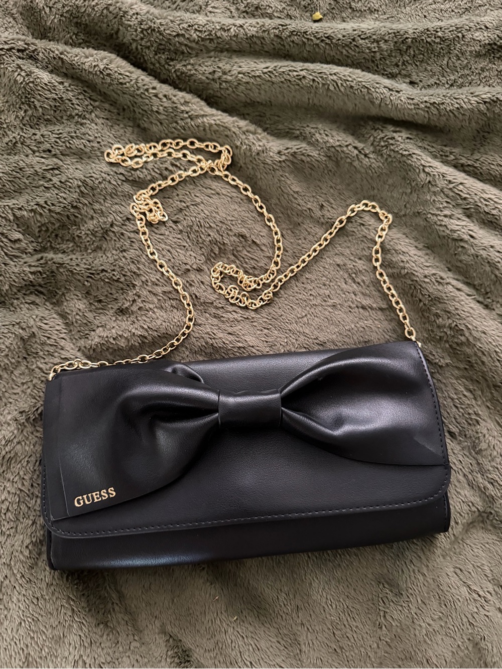 GUESS Black Clutch with Bow and Gold Chain, new without tag !